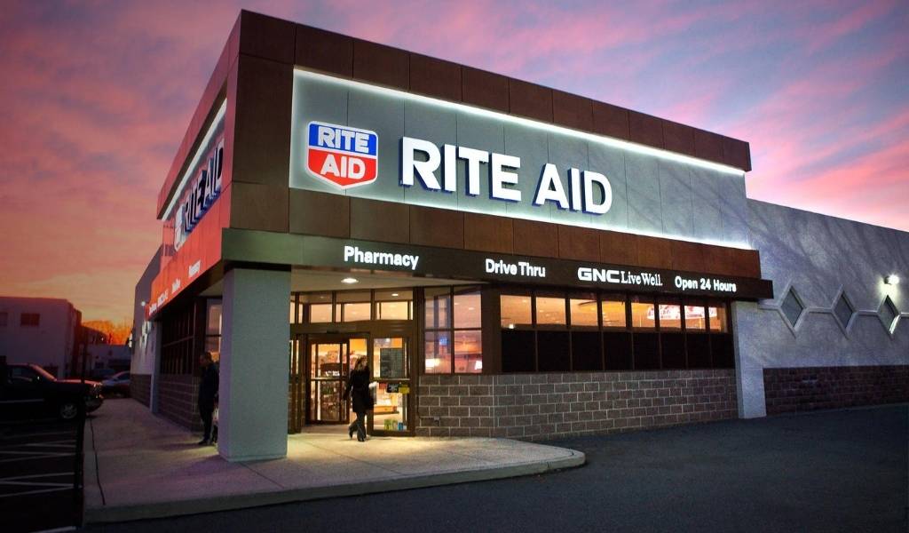 a Rite Aid store just after sunset